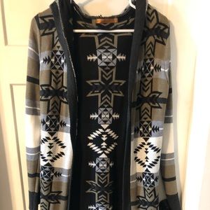 Long hooded sweater. Never worn.